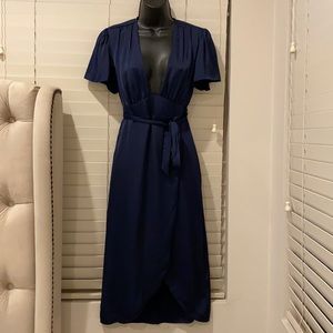 Navy blue satin plunge neck wrap dress